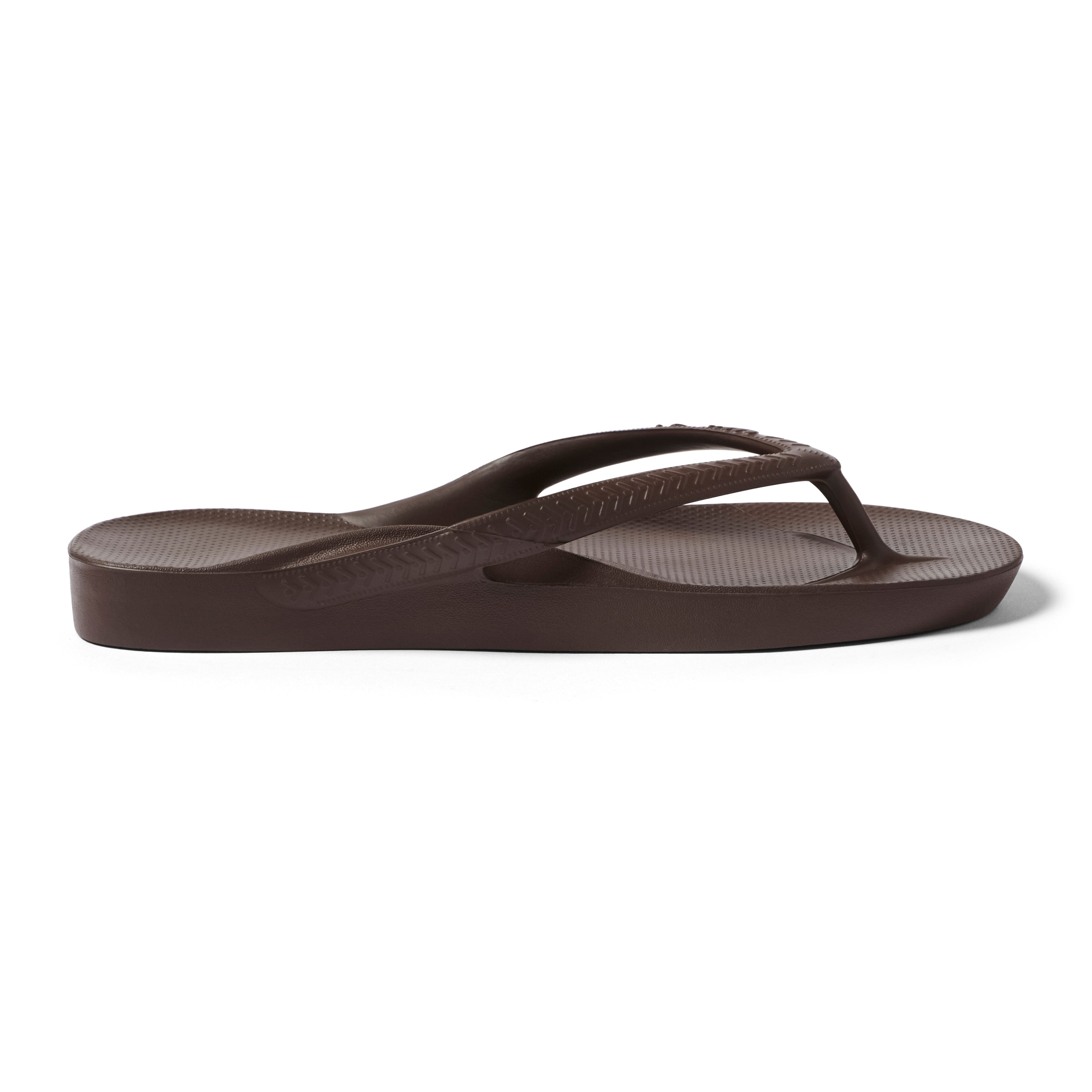 Archies Brown Arch Support Flip Flops — Side profile left shoe inside view