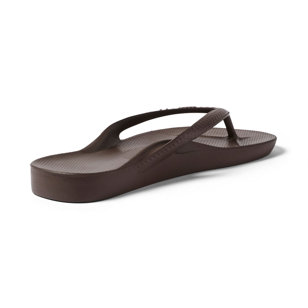 Archies Brown Arch Support Flip Flops — Left shoe back 3/4 angle showing arch and heel cup